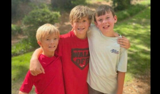 Sons Bridon and Christian and friend Sam.
