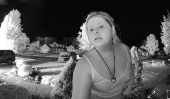 Haily Strong rings family's doorbell to warn them of garage fire.