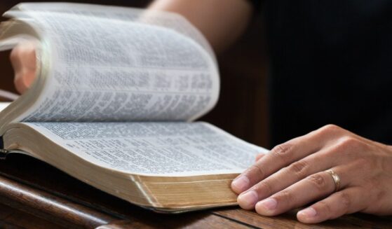 Man reading Bible.