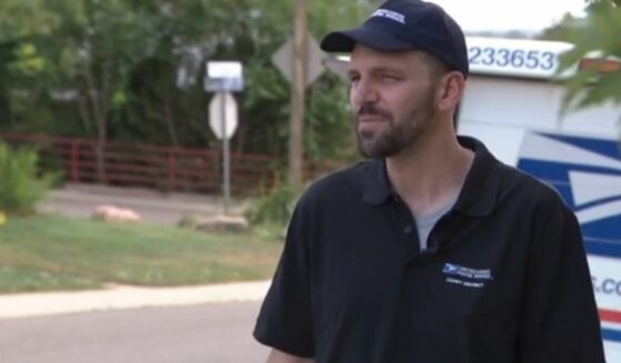 USPS mail carrier Andrew Russell sharing how he rescued a little girl from an idling car.