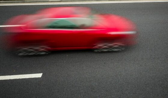 Speeding car.
