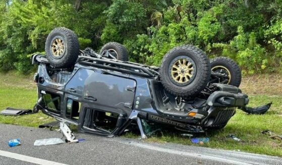 Overturned Jeep in Florida where man rescued baby trapped inside.