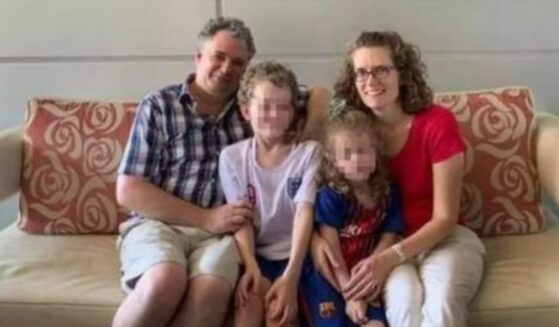 Helen Rhodes and her husband and 2 children.