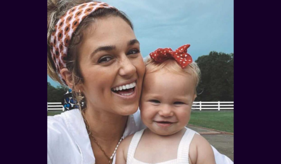 Sadie Robertson Huff and daughter on July 4, 2022