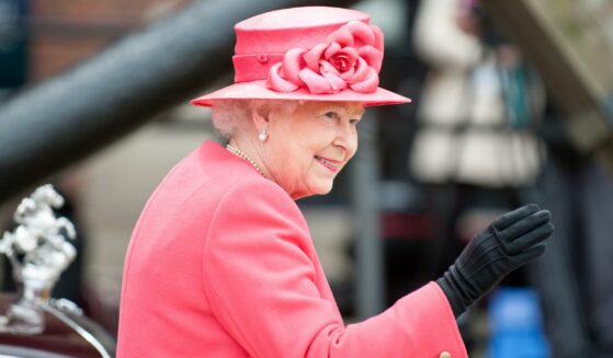 LIVERPOOL, ENGLAND - MAY 17 2012: Her Royal Highness Queen Elizabeth II visits Liverpool Albert Dock during her Diamond Jubilee tour of Great Britain, Liverpool, England. May 17 2012