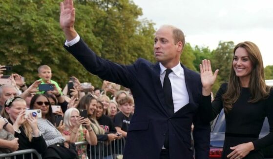 Kate Middleton and Prince William wave to mourners in the days after Queen Elizabeth II's passing.
