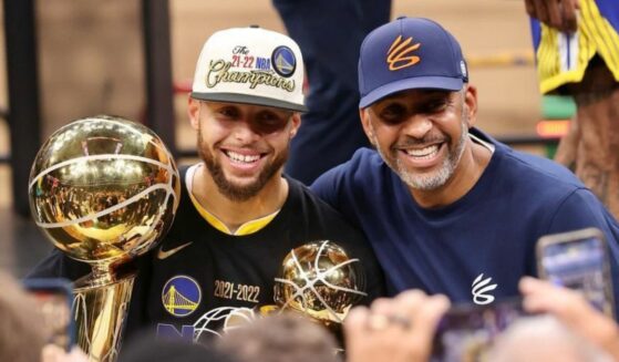 NBA Golden State Warriors star Steph Curry, left, with his dad, Dell Curry, right