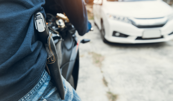 Thief with gun stock image