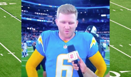 Dustin Hopkins with a football field in the background