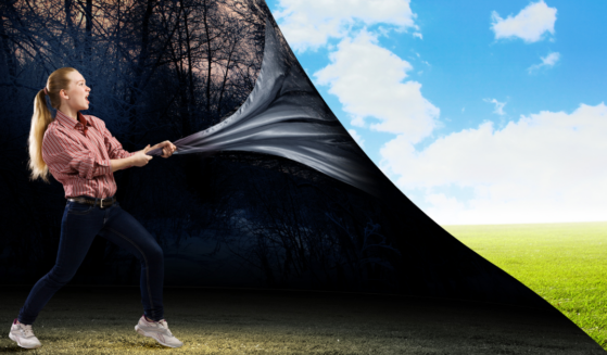 Shallow Blessings: Photo of woman pulling back the curtain on a false reality.