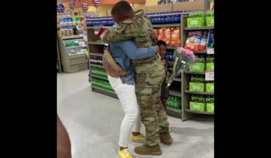 A military son returning home surprised his mom in the grocery store in July 2021